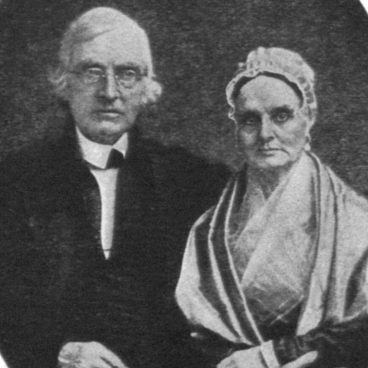 elderly caucasian couple wearing fine conservative dress of the mid 1800s