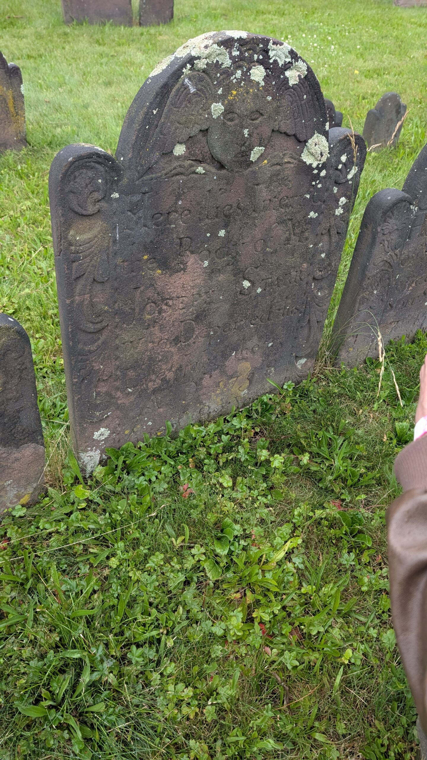 brownstone ornate grave marker with a face and scrolling inscribed Here lies interred
the Body of Mr.
Joseph Starr
who Departed this
life July the 13th
AD 1758
Aged 82 Years