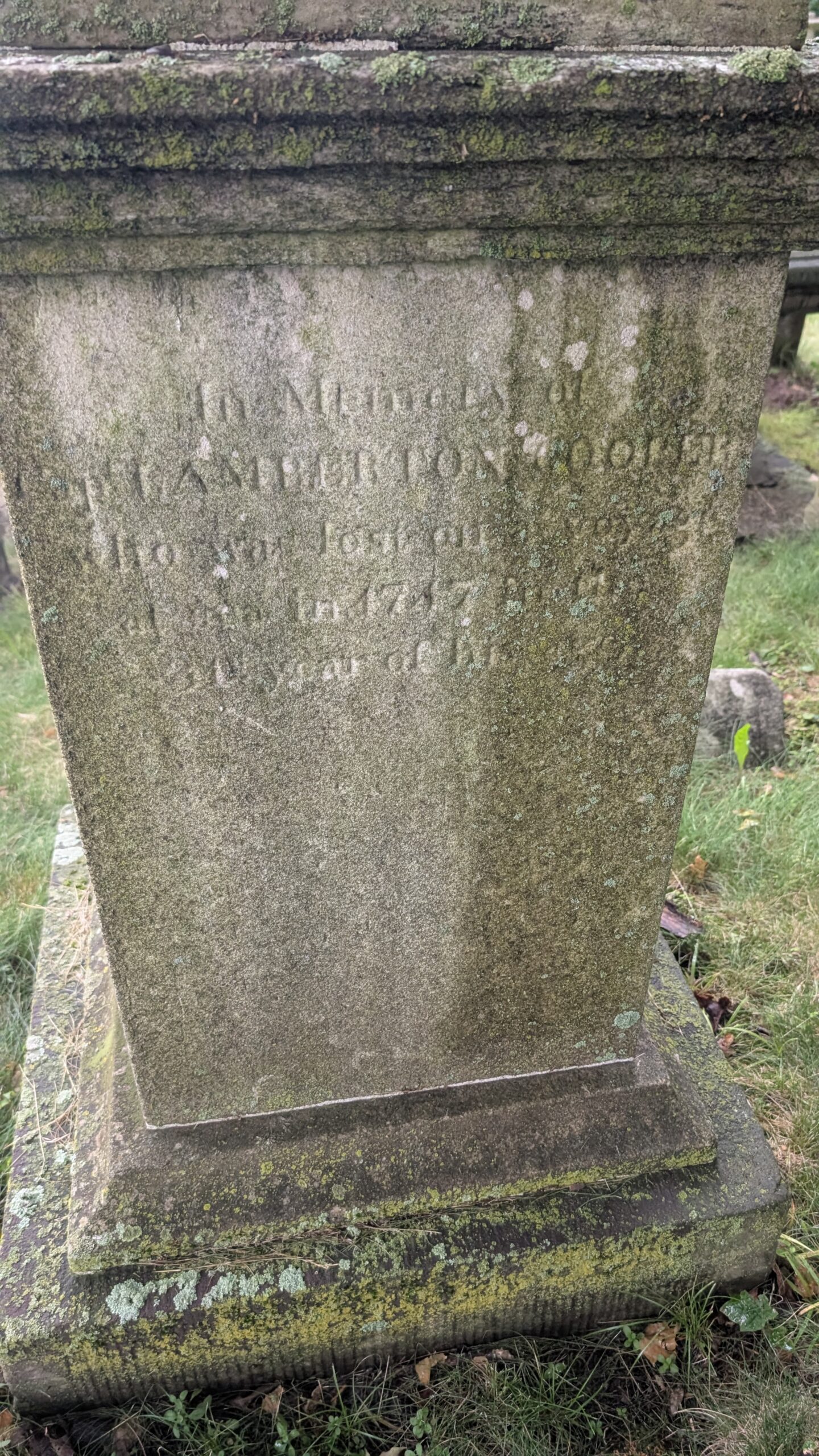 base of a large monument is inscribed "In Memory of Capt Lamberton Cooper who was lost on a voyage at sea in 1747 in the 31 year of his age."