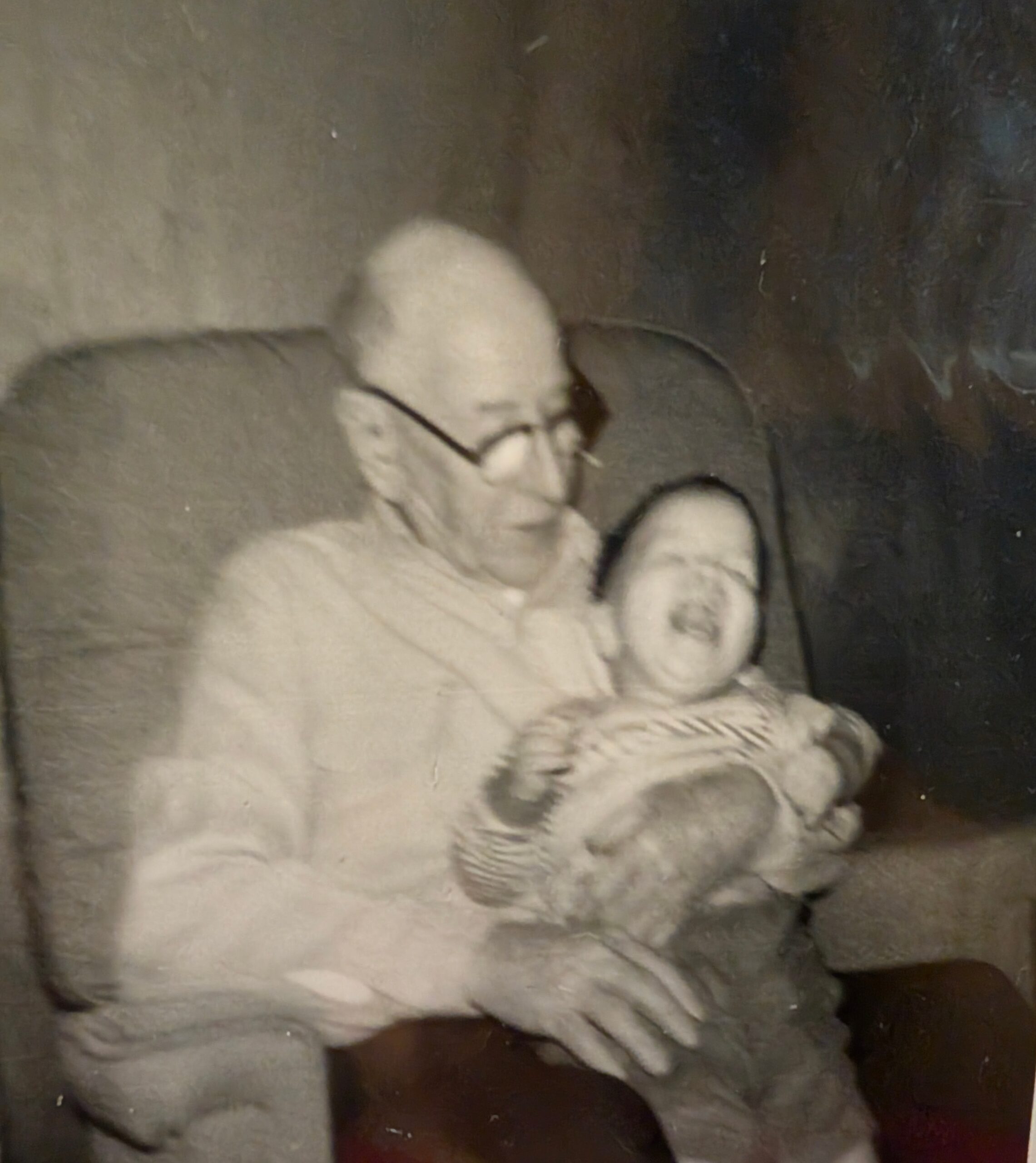 Lee Kelly holding Christopher Kelly