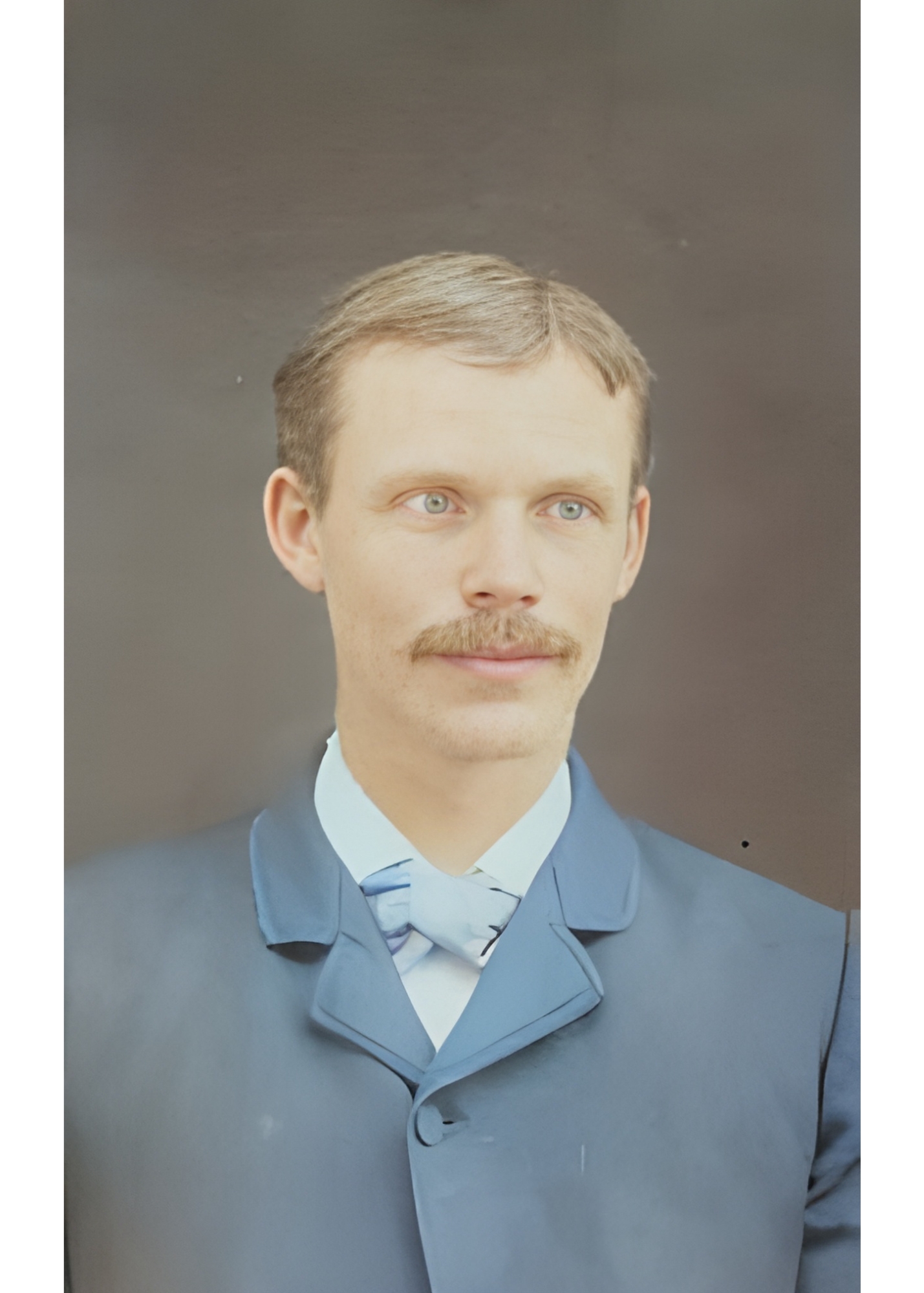 photo of thin man with brown hair dressed in suit typical of early 18th century with a bowtie